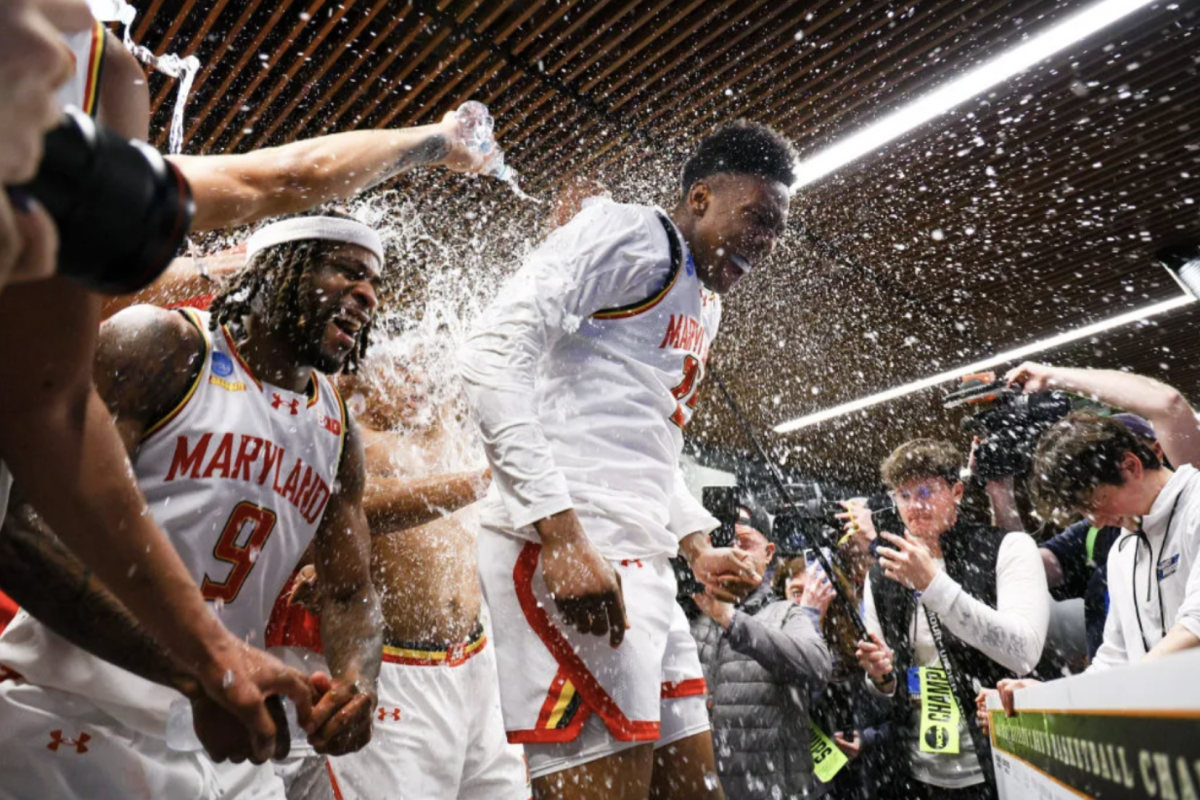 Maryland’s Derik Queen celebrates a buzzer-beater victory alongside teammates during the tournament in 2025.
