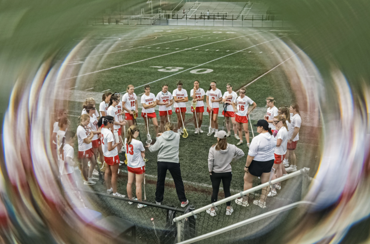 Harborwomen gather in a huddle during their competitive game against Concord Carlisle last year during April Break. 