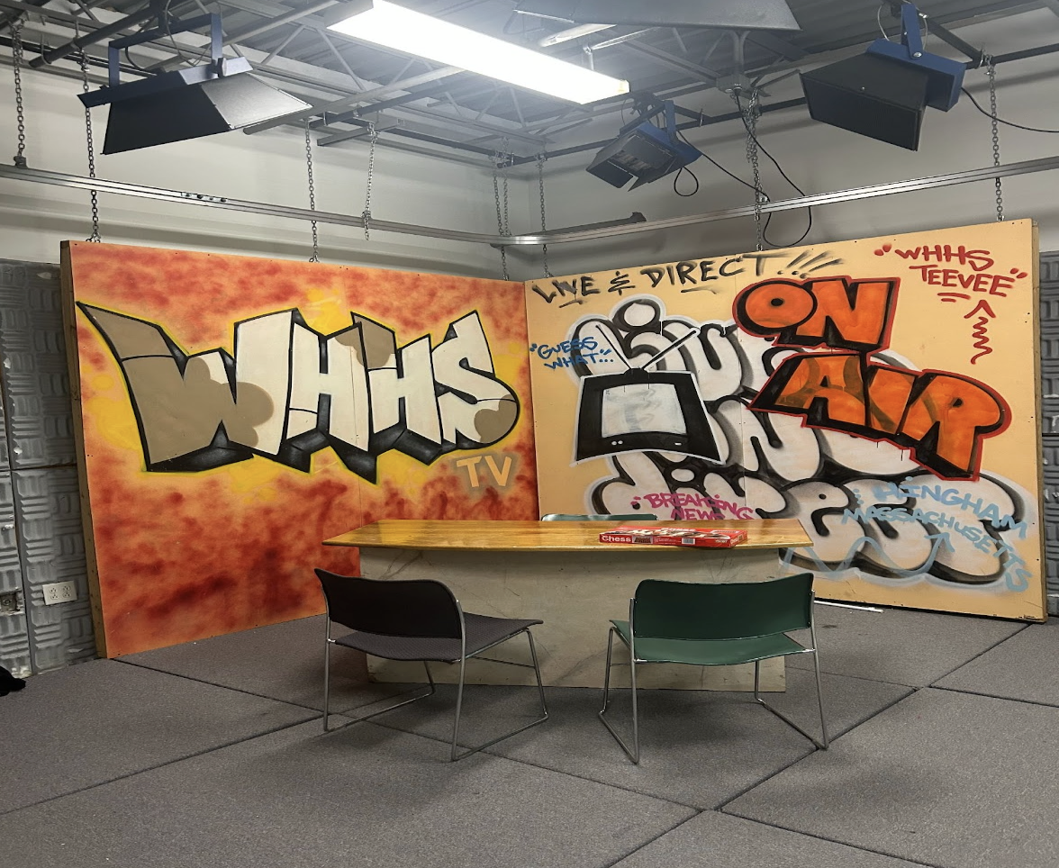 One of the sets where the Friday Show is recorded and produced, with a colorful background designed by students.