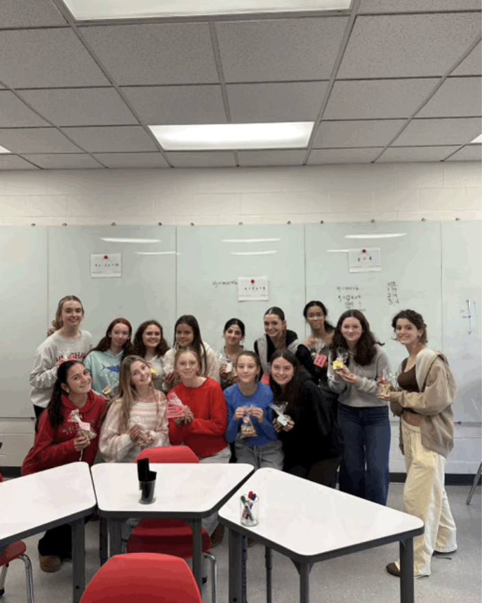 Animal Advocates meeting before school to package treats for the Scituate Animal Shelter!