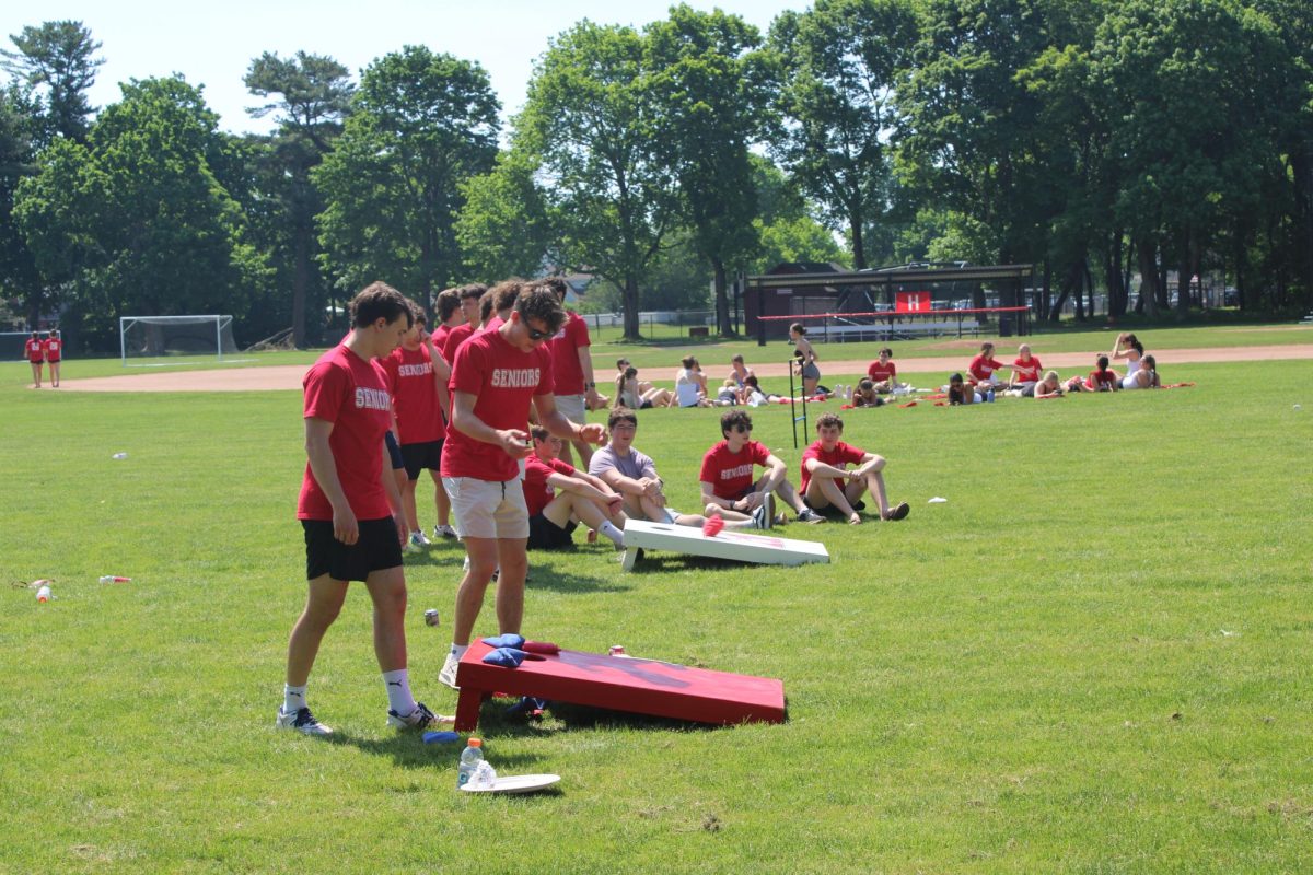 Seniors play field games on their last day. 