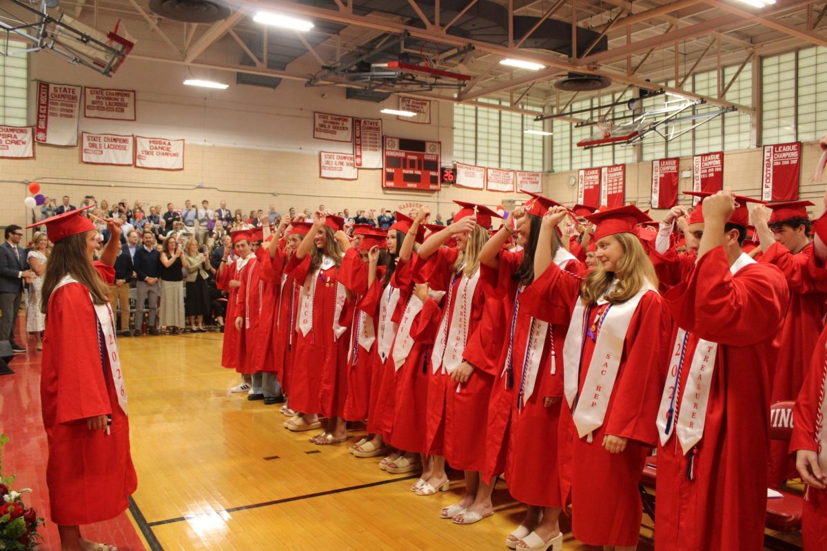 Emily Kiernan, Class President of 2026, leads her class in the ceremonial tassel toss. 