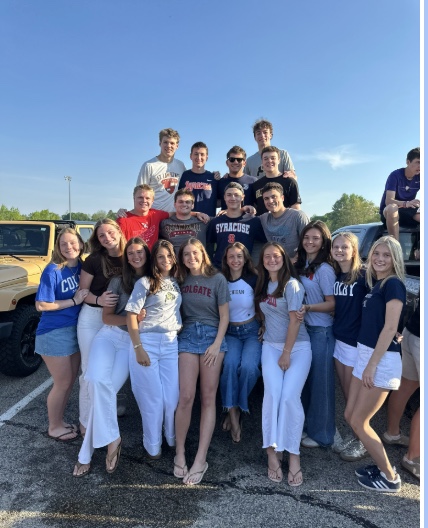 Seniors take photos in far lot before their last day of school. 