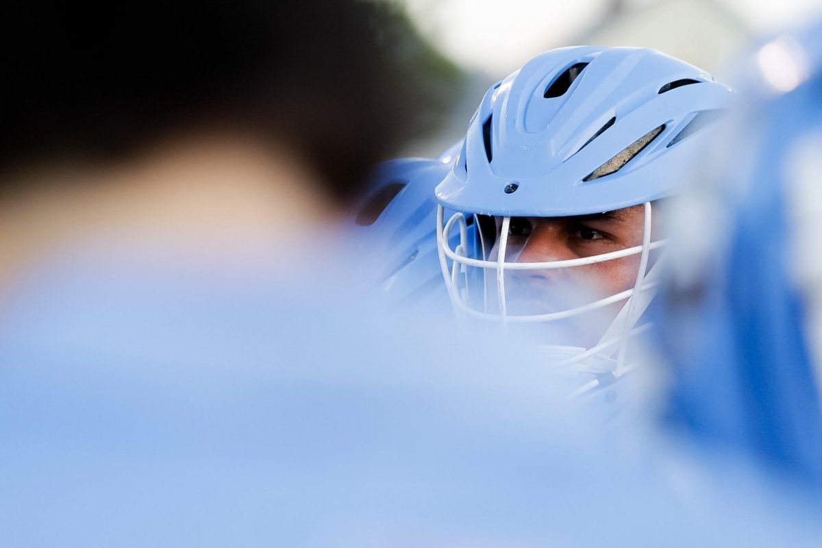 Tufts’ Jack Regnery in the team huddle prior to the Jumbos playing the Wesleyan Cardinals in the division three men’s lacrosse final four playoffs.