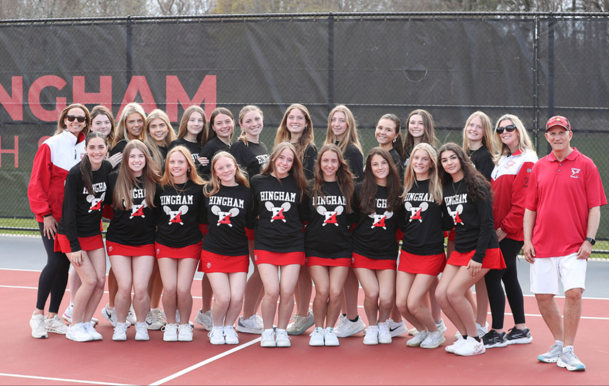 The Hingham Girls Tennis team poses for a team photo in their uniforms.
