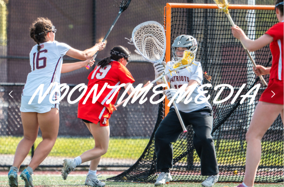 Vivien Nicholas rolls past her defender and scores to add to the Harborwomen lead in their 17-14 victory against Concord Carlisle.