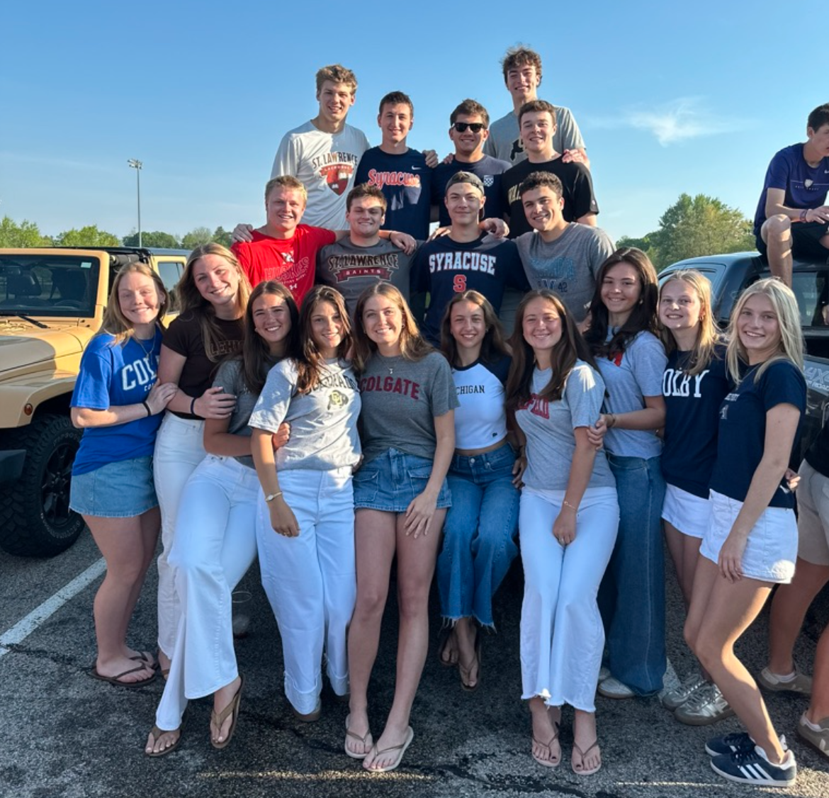 Seniors take photos in the far parking lot before their last day of school.