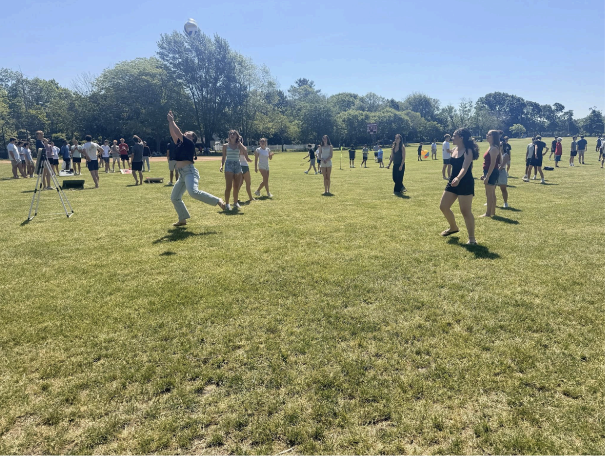 An intense volleyball game is held between sophomores and freshmen.