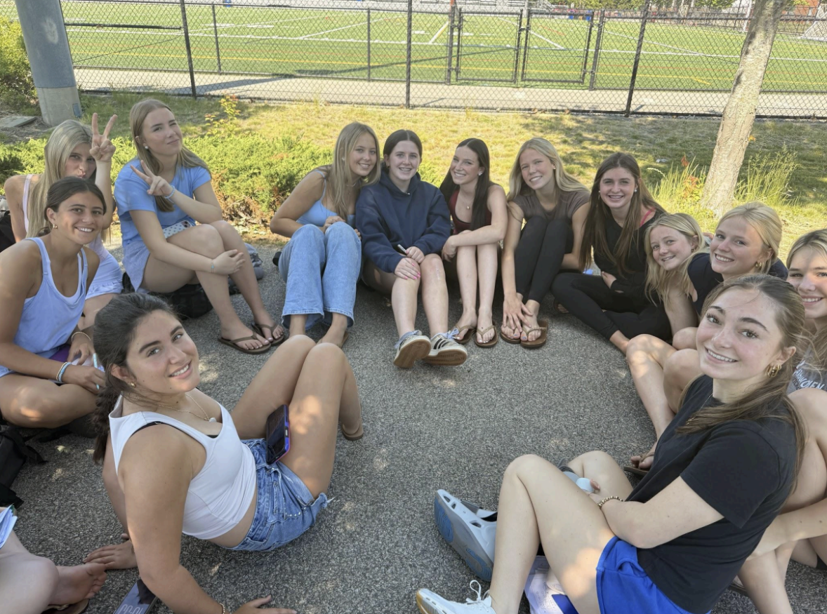 Freshmen girls circle up as they all Breathe Out.