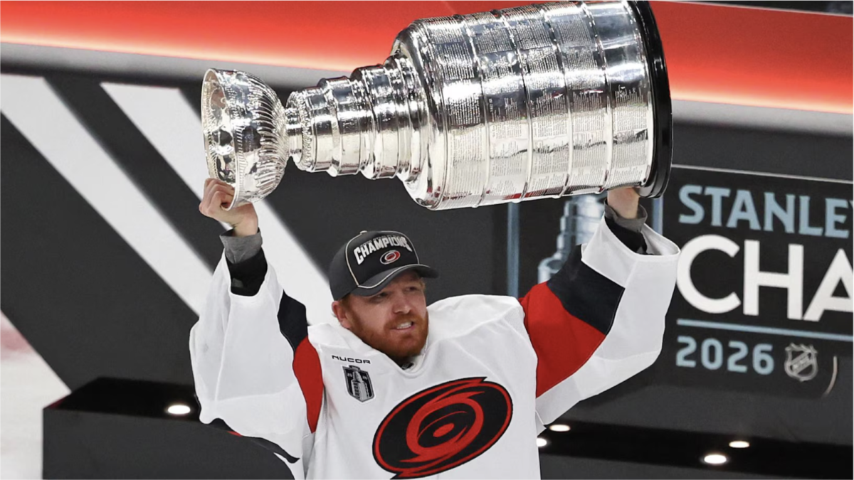 Carolina Hurricanes goaltender Frederick Andersen lifts the Stanley Cup (photo by Ethan Miller)
